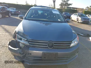2015 Volkswagen Jetta Sport with VIN 3VWD17AJ2FM318669, listed as a IAAI auction lot 41266868 with 124,539 mi miles and . Bid and sale history available at DreamBid. Image 12.