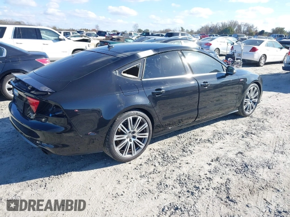 2013 Audi A7 3.0 Prestige with VIN WAU2GAFC2DN065112, listed as a IAAI auction lot 41117426 with 159,105 mi miles. Bid and sale history available at carsss.com. Image 4.