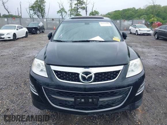 2012 Mazda CX-9 Grand Touring z VIN JM3TB3DV1C0360212, wystawiony jako IAAI lot #42232584 z przebiegiem 99 582 mil mil oraz . Historia ofert i sprzedaży dostępna na DreamBid. Obrazek 12.