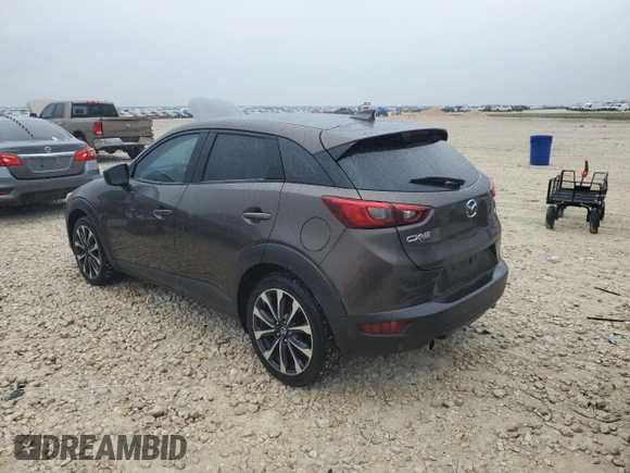 2019 Mazda CX-3 Touring z VIN JM1DKDC71K1408158, wystawiony jako Copart lot #50463675 z przebiegiem 95 578 mil mil oraz Czysty tytuł • Clean title. Historia ofert i sprzedaży dostępna na DreamBid. Obrazek 2.