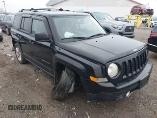 2014 Jeep Patriot Limited with VIN 1C4NJRCBXED503572, listed as a IAAI auction lot 41937793 with 112,015 mi miles. Bid and sale history available at carsss.com. Image 1.