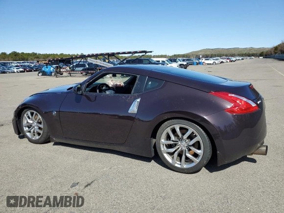 2014 Nissan 370Z Touring with VIN JN1AZ4EH6EM633637, listed as a Copart auction lot 50797105 with 0 mi miles and Salvage Title. Bid and sale history available at carsss.com. Image 2.