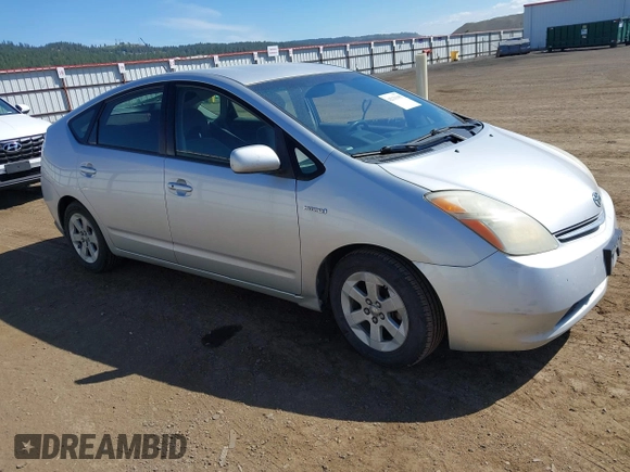 2007 Toyota Prius with VIN JTDKB20U677611878, listed as a IAAI auction lot 42233105 with 291,499 mi miles and . Bid and sale history available at DreamBid. Image 1.