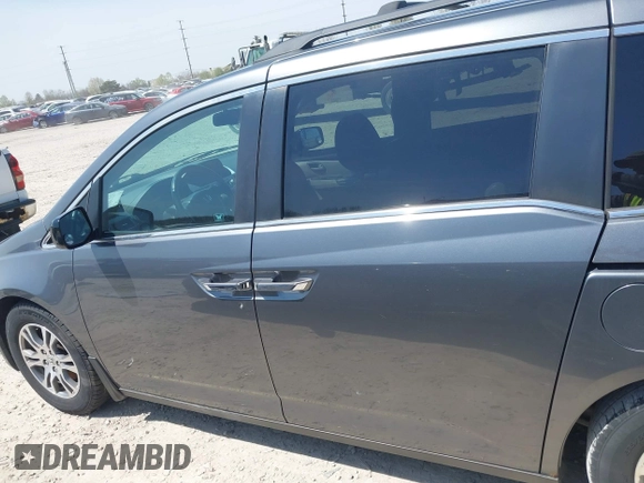 2012 Honda Odyssey EX-L with VIN 5FNRL5H69CB047425, listed as a IAAI auction lot 42064979 with 242,409 mi miles and . Bid and sale history available at carsss.com. Image 15.