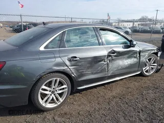 2022 Audi A4 S line Premium Plus z VIN WAUEAAF41NN015360, wystawiony jako IAAI lot #41320262 z przebiegiem 63 275 mil mil oraz . Historia ofert i sprzedaży dostępna na DreamBid. Obrazek 19.