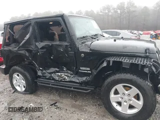 2012 Jeep Wrangler Sport z VIN 1C4AJWAG8CL262755, wystawiony jako IAAI lot #41566823 z przebiegiem 164 135 mil mil oraz . Historia ofert i sprzedaży dostępna na DreamBid. Obrazek 6.