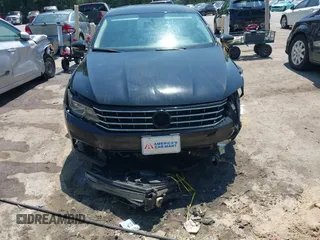 2016 Volkswagen Passat S with VIN 1VWAS7A36GC040993, listed as a IAAI auction lot 40010088 with 105,400 mi miles and . Bid and sale history available at DreamBid. Image 6.