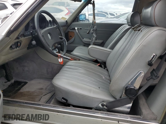 1985 Mercedes-Benz SL with VIN WDBBA45C6FA024529, listed as a Copart auction lot 73559924 with 75,789 mi miles and Salvage title. Bid and sale history available at DreamBid. Image 7.