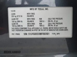 2021 Tesla Model Y Long Range with VIN 5YJYGDEEXMF092901, listed as a IAAI auction lot 42164866 with 61,240 mi miles and . Bid and sale history available at carsss.com. Image 9.