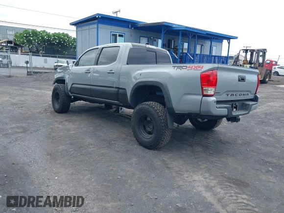 2018 Toyota Tacoma SR5 with VIN 3TMDZ5BN3JM039497, listed as a IAAI auction lot 42326823 with 92,977 mi miles and . Bid and sale history available at DreamBid. Image 3.