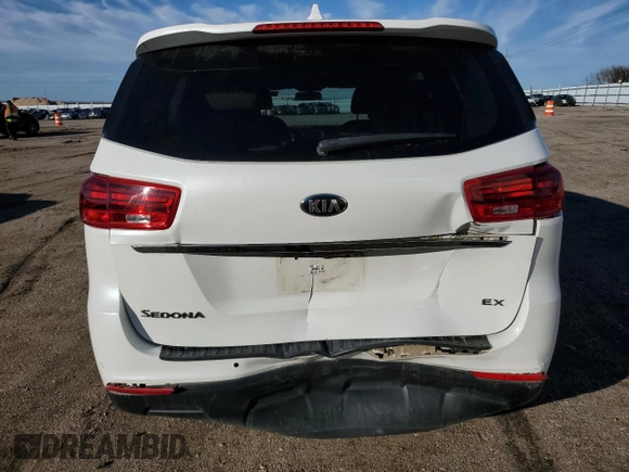 2021 Kia Sedona LX with VIN KNDMB5C19M6673451, listed as a Copart auction lot 78464884 with 70,498 mi miles and Salvage Title. Bid and sale history available at carsss.com. Image 6.
