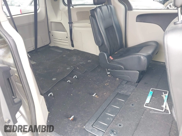2017 Dodge Grand Caravan SXT with VIN 2C4RDGCG6HR671199, listed as a IAAI auction lot 42031157 with 99,189 mi miles and . Bid and sale history available at DreamBid. Image 8.