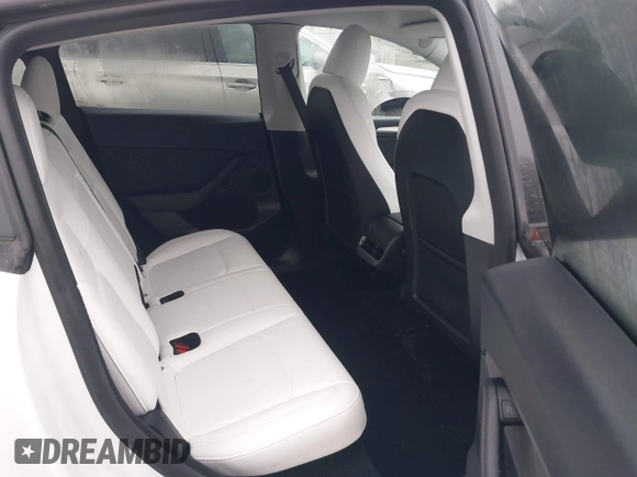 2023 Tesla Model Y Performance z VIN 7SAYGDEF2PF917295, wystawiony jako IAAI lot #41260852 z przebiegiem 23 295 mil mil oraz . Historia ofert i sprzedaży dostępna na DreamBid. Obrazek 8.