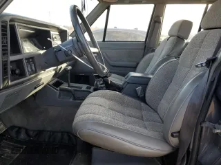 1992 Jeep Cherokee with VIN 1J4FJ58S7NL136135, listed as a Copart auction lot 86016134 with 160,259 mi miles and Clean title. Bid and sale history available at DreamBid. Image 7.