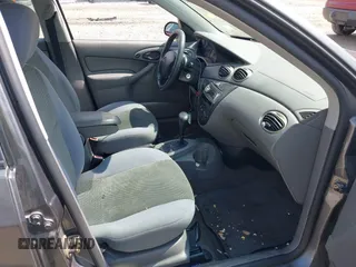 2004 Ford Focus SE with VIN 1FAFP34334W177338, listed as a IAAI auction lot 42003202 with 190,581 mi miles and . Bid and sale history available at DreamBid. Image 5.