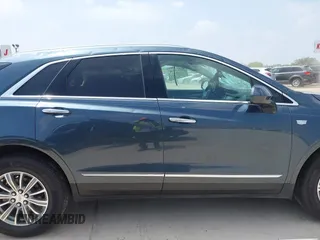 2019 Cadillac XT5 Luxury FWD z VIN 1GYKNCRS1KZ259282, wystawiony jako IAAI lot #41921030 z przebiegiem 27 880 mil mil oraz . Historia ofert i sprzedaży dostępna na DreamBid. Obrazek 13.
