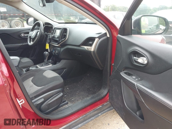 2015 Jeep Cherokee Sport with VIN 1C4PJMAB2FW708811, listed as a IAAI auction lot 42571034 with 116,790 mi miles and . Bid and sale history available at DreamBid. Image 5.