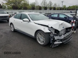 2024 BMW 5 Series 530i xDrive with VIN WBA53FJ01RCP97253, listed as a Copart auction lot 50888795 with 11,985 mi miles and Salvage title. Bid and sale history available at DreamBid. Image 4.