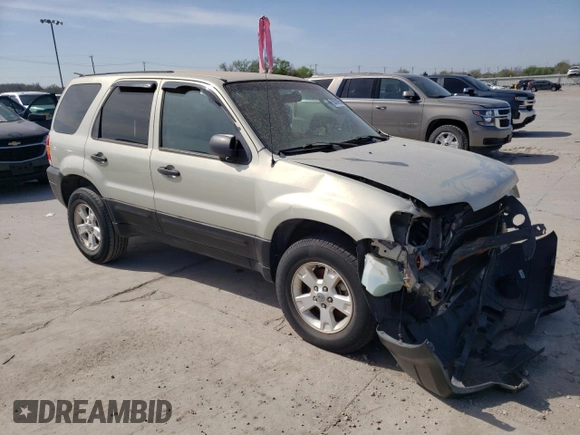 2005 Ford Escape XLT with VIN 1FMYU93105KC50944, listed as a Copart auction lot 50500965 with 133,532 mi miles and Salvage Title. Bid and sale history available at DreamBid. Image 4.