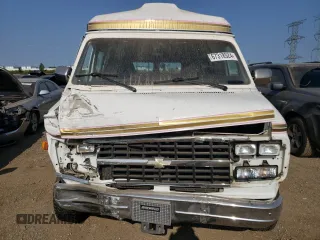 1992 Chevrolet Chevy Van z VIN 2GBEG25K3N4117707, wystawiony jako Copart lot #67318524 z przebiegiem 181 994 mil mil oraz Szkoda całkowita • Salvage title. Historia ofert i sprzedaży dostępna na DreamBid. Obrazek 5.
