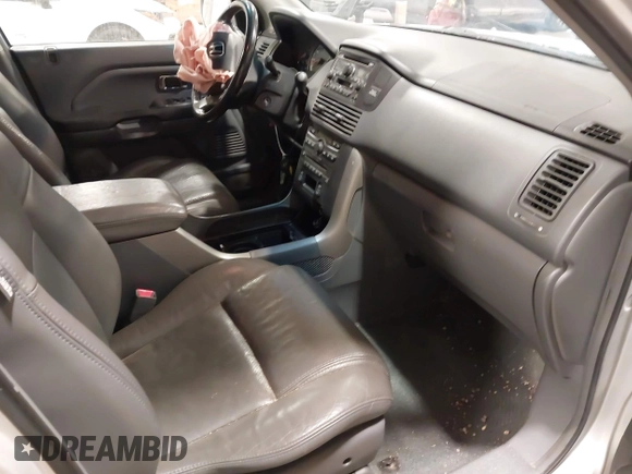 2005 Honda Pilot EX-L with VIN 2HKYF18575H557005, listed as a IAAI auction lot 41647830 with 245,992 mi miles. Bid and sale history available at carsss.com. Image 5.