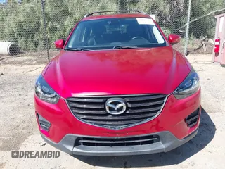 2016 Mazda CX-5 Grand Touring with VIN JM3KE2DY3G0686588, listed as a IAAI auction lot 41697312 with 65,090 mi miles. Bid and sale history available at carsss.com. Image 12.