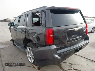 2015 Chevrolet Tahoe LT with VIN 1GNSCBKC5FR504459, listed as a IAAI auction lot 41689405 with 141,783 mi miles and . Bid and sale history available at DreamBid. Image 3.