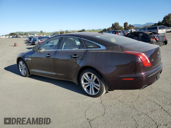 2014 Jaguar XJ with VIN SAJWA1CZ3E8V69877, listed as a Copart auction lot 48159005 with 57,567 mi miles and Clean Title. Bid and sale history available at DreamBid. Image 2.