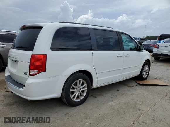 2014 Dodge Grand Caravan SXT z VIN 2C4RDGCG7ER214087, wystawiony jako Copart lot #61096815 z przebiegiem 131 241 mil mil oraz Czysty tytuł • Clean title. Historia ofert i sprzedaży dostępna na DreamBid. Obrazek 3.