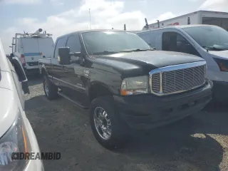 2003 Ford F-250 XL with VIN 1FTNW21P03EC70140, listed as a Copart auction lot 60461875 with 133,397 mi miles and Clean title. Bid and sale history available at DreamBid. Image 4.