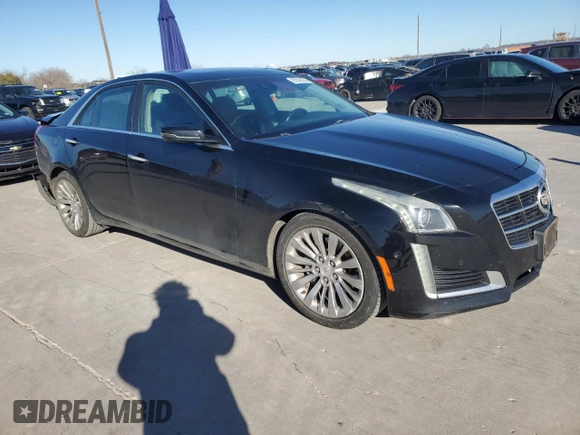 2014 Cadillac CTS Performance RWD with VIN 1G6AS5SX7E0184479, listed as a Copart auction lot 87076074 with 121,927 mi miles and Clean title. Bid and sale history available at DreamBid. Image 4.