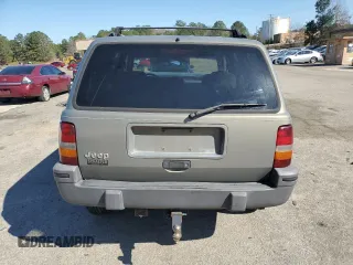 1995 Jeep Grand Cherokee Laredo with VIN 1J4GZ58S9SC706256, listed as a Copart auction lot 46635685 with 388,975 mi miles and Salvage Title. Bid and sale history available at carsss.com. Image 6.