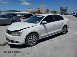 2012 Volkswagen Jetta SE z VIN 3VWDX7AJ9CM382590, wystawiony jako Copart lot #52872515 z przebiegiem 157 750 mil mil oraz Szkoda całkowita • Salvage title. Historia ofert i sprzedaży dostępna na DreamBid. Obrazek 1.