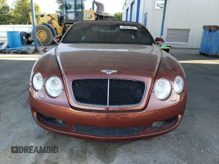 2007 Bentley Continental GT with VIN SCBDR33W77C047935, listed as a Copart auction lot 60557985 with 61,661 mi miles and Salvage title. Bid and sale history available at DreamBid. Image 5.