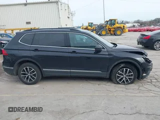 2021 Volkswagen Tiguan SE with VIN 3VV2B7AXXMM057849, listed as a IAAI auction lot 41879768 with 88,353 mi miles and . Bid and sale history available at DreamBid. Image 13.