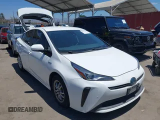 2020 Toyota Prius L Eco z VIN JTDKARFU0L3112403, wystawiony jako IAAI lot #42687213 z przebiegiem 94 386 mil mil oraz . Historia ofert i sprzedaży dostępna na DreamBid. Obrazek 1.
