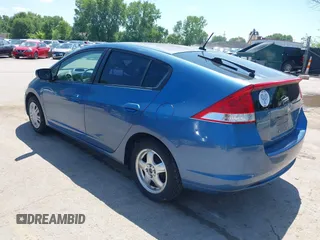 2010 Honda Insight LX with VIN JHMZE2H56AS013649, listed as a IAAI auction lot 42646690 with 5,593 mi miles and . Bid and sale history available at DreamBid. Image 3.