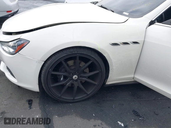 2014 Maserati Ghibli S Q4 with VIN ZAM57RTA3E1090350, listed as a IAAI auction lot 42056682 with 119,160 mi miles and . Bid and sale history available at DreamBid. Image 18.