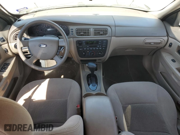 2004 Ford Taurus SE with VIN 1FAFP53U04A141688, listed as a Copart auction lot 55606685 with 134,548 mi miles and Salvage Title. Bid and sale history available at DreamBid. Image 8.