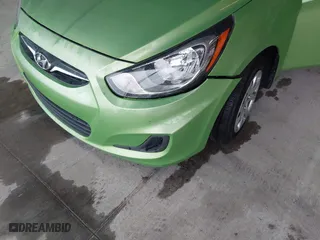 2014 Hyundai Accent GS with VIN KMHCT5AE6EU168619, listed as a IAAI auction lot 41856429 with 227,552 mi miles. Bid and sale history available at carsss.com. Image 6.