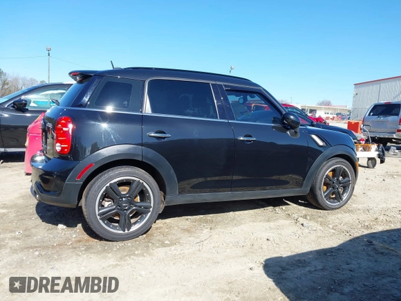 2015 MINI Countryman S with VIN WMWZC3C5XFWT04916, listed as a IAAI auction lot 41636369 with 101,448 mi miles and . Bid and sale history available at DreamBid. Image 13.