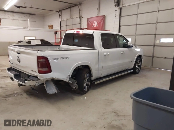 2021 Ram 1500 Laramie with VIN 1C6SRFJT6MN671456, listed as a IAAI auction lot 41087757 with 40,593 mi miles and . Bid and sale history available at DreamBid. Image 4.