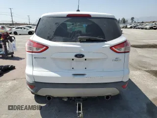 2013 Ford Escape SE with VIN 1FMCU0GX2DUB31767, listed as a Copart auction lot 62208645 with 95,015 mi miles and Salvage title. Bid and sale history available at DreamBid. Image 6.