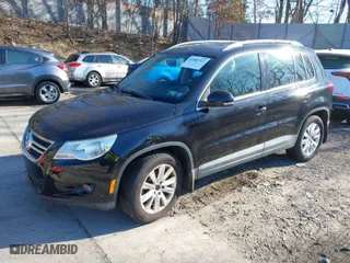 2009 Volkswagen Tiguan S with VIN WVGAV75N69W509504, listed as a IAAI auction lot 41881323 with 83,435 mi miles. Bid and sale history available at carsss.com. Image 2.