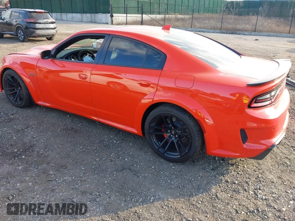 2022 Dodge Charger Scat Pack Widebody with VIN 2C3CDXGJ3NH101081, listed as a IAAI auction lot 41351466 with 9,575 mi miles and . Bid and sale history available at DreamBid. Image 3.