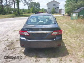 2011 Toyota Corolla L with VIN 2T1BU4EE0BC680158, listed as a IAAI auction lot 42060987 with 131,669 mi miles. Bid and sale history available at carsss.com. Image 16.