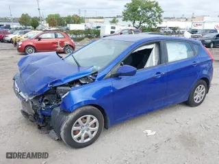2012 Hyundai Accent GS with VIN KMHCT5AE9CU036421, listed as a IAAI auction lot 40410679 with 99,288 mi miles. Bid and sale history available at carsss.com. Image 2.