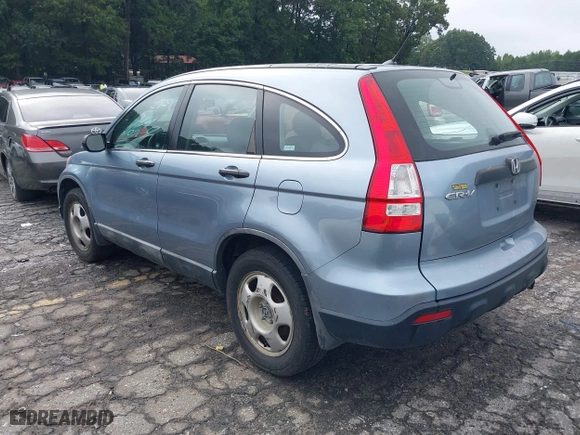 2008 Honda CR-V LX with VIN 3CZRE38348G700954, listed as a IAAI auction lot 37268497 with 140,121 mi miles. Bid and sale history available at carsss.com. Image 3.