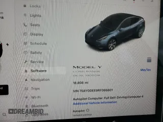 2024 Tesla Model Y Long Range with VIN 7SAYGDEE9RF069801, listed as a Copart auction lot 60857145 with 18,808 mi miles and Salvage title. Bid and sale history available at DreamBid. Image 9.