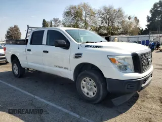2017 Nissan Titan with VIN 1N6AA1F10HN501280, listed as a Copart auction lot 43782625 with 217,906 mi miles and Clean title. Bid and sale history available at DreamBid. Image 4.